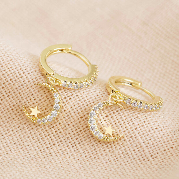 crystal-moon-huggie-hoop-earrings-in-gold-o21a5513-620x620