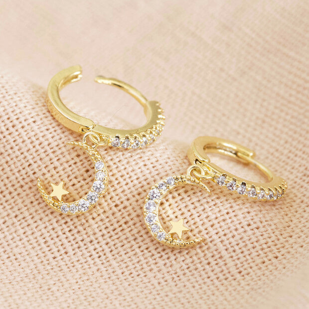 crystal-moon-huggie-hoop-earrings-in-gold-o21a5515-620x620