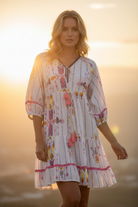 Kaftan on blonde model at sunset